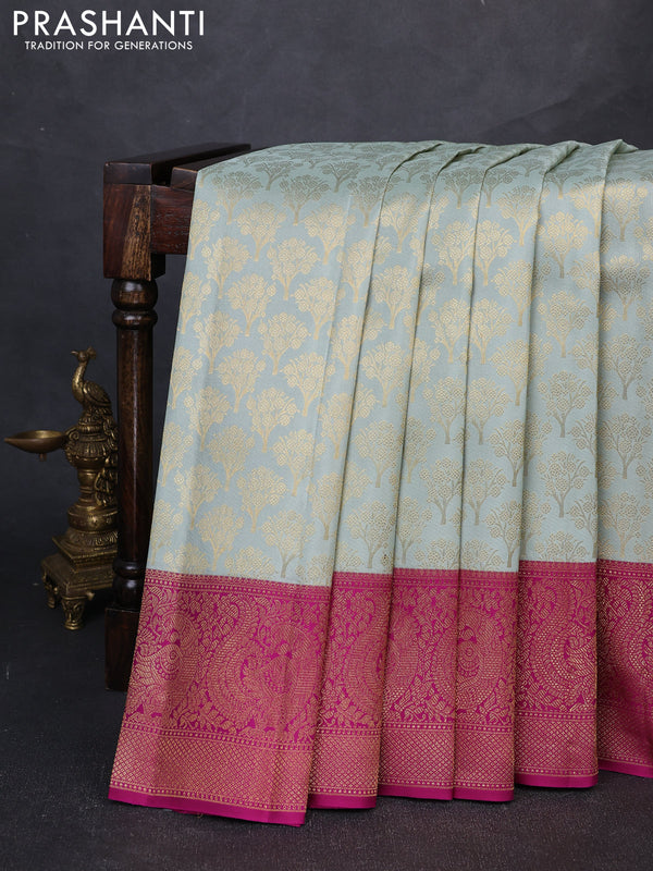Pure kanchipuram silk saree pastel blue and purple with allover zari woven brocade weaves and long rich zari woven annam border