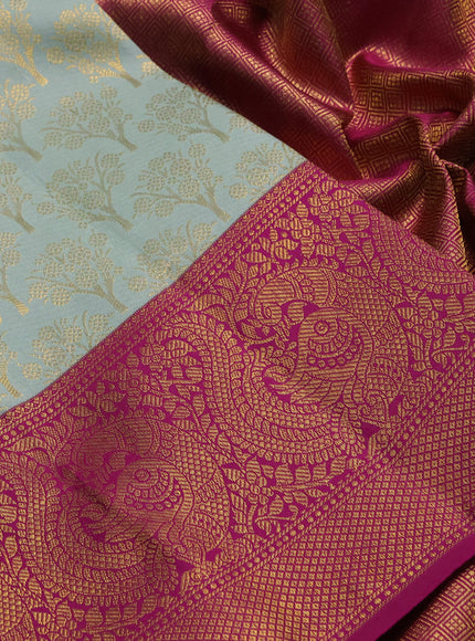 Pure kanchipuram silk saree pastel blue and purple with allover zari woven brocade weaves and long rich zari woven annam border