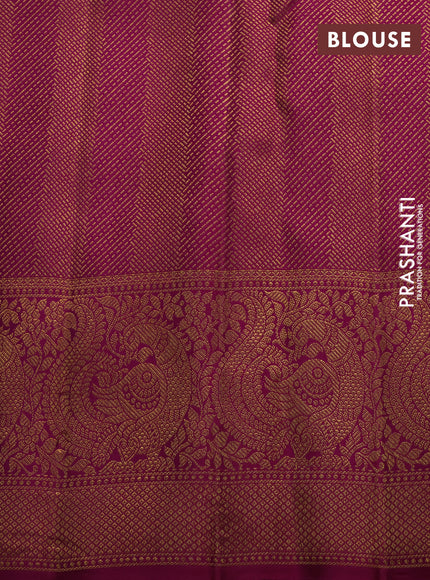 Pure kanchipuram silk saree pastel blue and purple with allover zari woven brocade weaves and long rich zari woven annam border