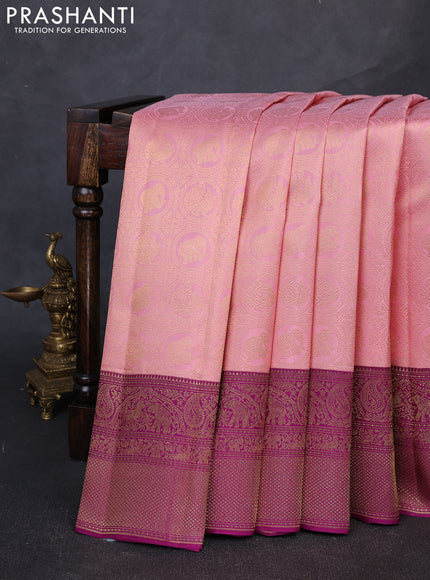 Pure kanchipuram silk saree peach shade and purple with allover zari woven brocade weaves and long rich zari woven border