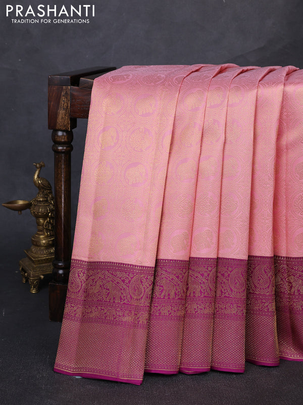 Pure kanchipuram silk saree peach shade and purple with allover zari woven brocade weaves and long rich zari woven border