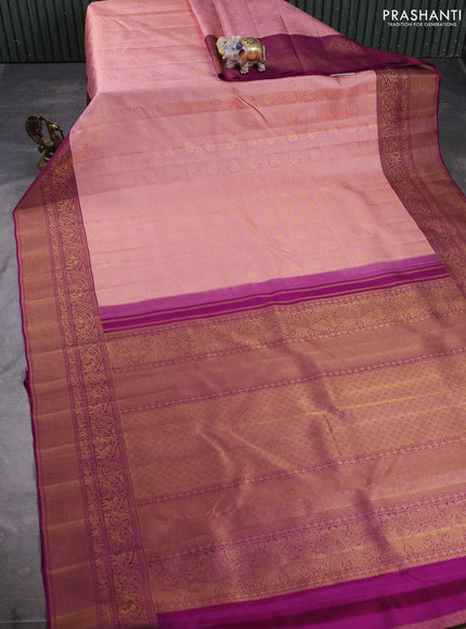 Pure kanchipuram silk saree peach shade and purple with allover zari woven brocade weaves and long rich zari woven border