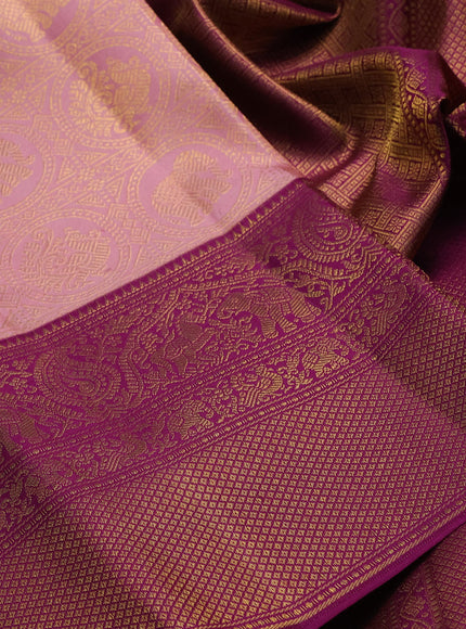 Pure kanchipuram silk saree peach shade and purple with allover zari woven brocade weaves and long rich zari woven border