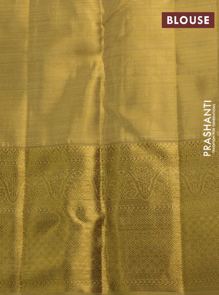 Pure kanchipuram tissue silk saree gold with allover zari woven brocade weaves and long rich zari woven border