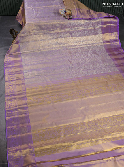 Pure kanchipuram tissue silk saree pastel lavender with allover zari woven brocade weaves and long rich zari woven border