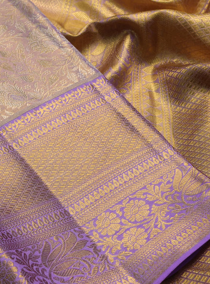 Pure kanchipuram tissue silk saree pastel lavender with allover zari woven brocade weaves and long rich zari woven border