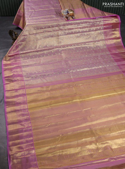 Pure kanchipuram tissue silk saree pastel pink with allover zari woven brocade weaves and long rich zari woven border