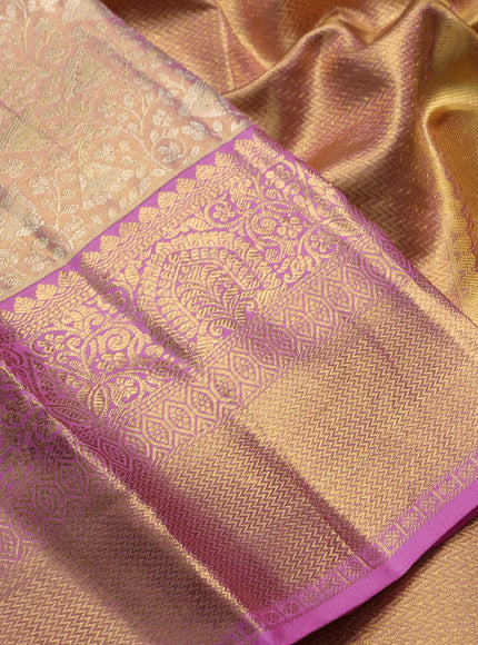 Pure kanchipuram tissue silk saree pastel pink with allover zari woven brocade weaves and long rich zari woven border