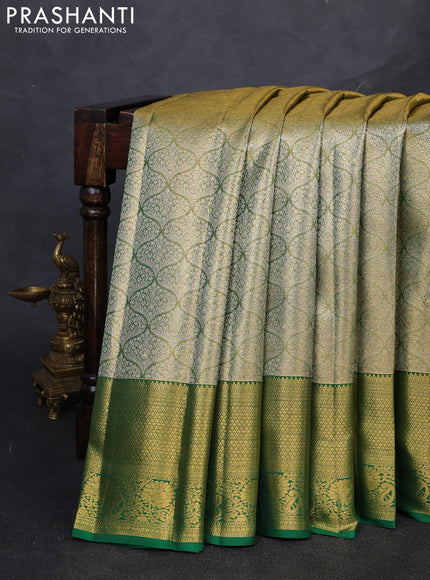 Pure kanchipuram tissue silk saree golden green and green with allover silver zari woven brocade weaves and rich zari woven border