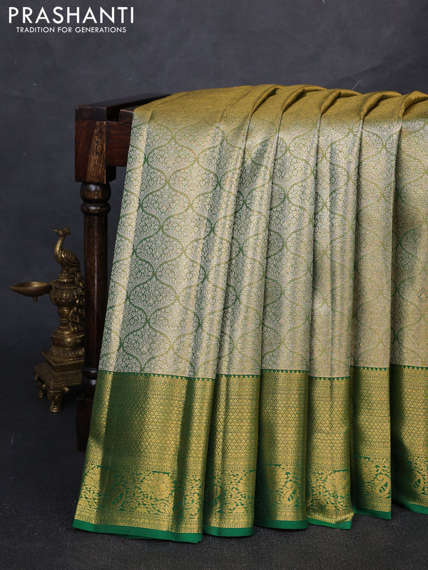 Pure kanchipuram tissue silk saree golden green and green with allover silver zari woven brocade weaves and rich zari woven border