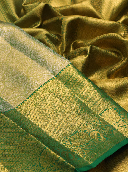 Pure kanchipuram tissue silk saree golden green and green with allover silver zari woven brocade weaves and rich zari woven border