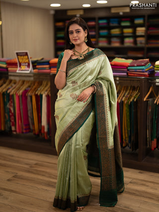 Banarasi raw silk saree pista green and green with allover thread & zari woven buttas and thread & zari woven border