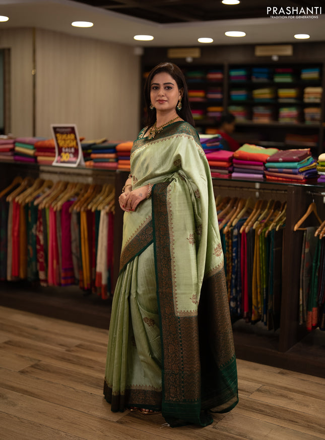 Banarasi raw silk saree pista green and green with allover thread & zari woven buttas and thread & zari woven border