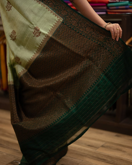 Banarasi raw silk saree pista green and green with allover thread & zari woven buttas and thread & zari woven border