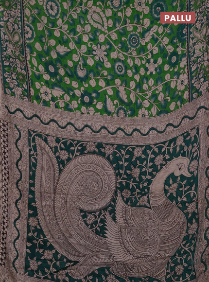 Kota kalamkari cotton saree light green and teal green with allover prints and piping border