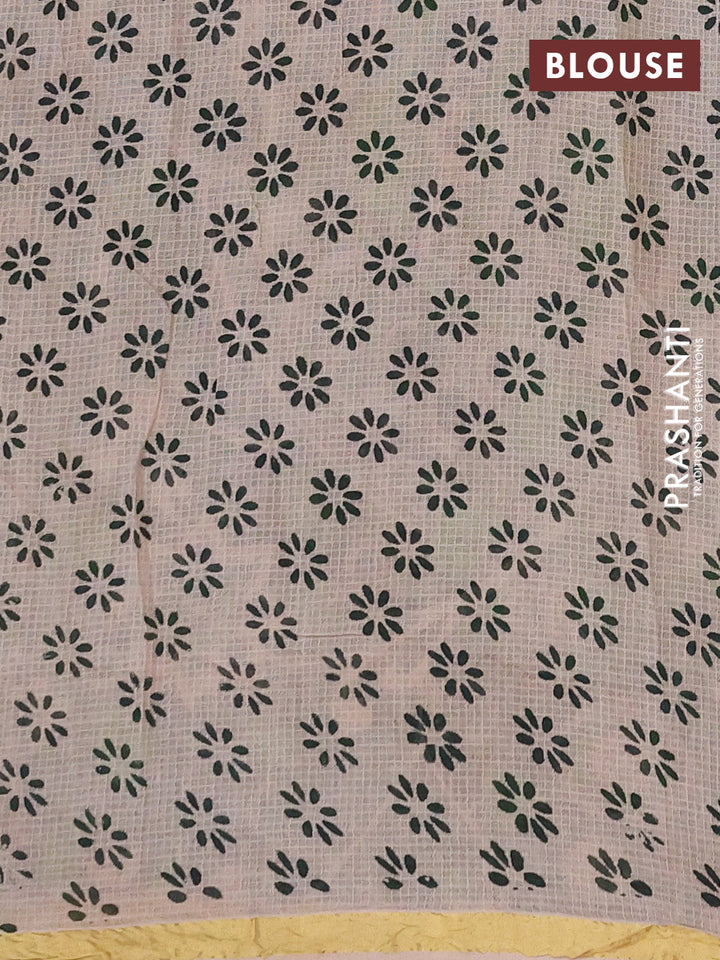 Kota kalamkari cotton saree beige and bottle green with allover prints and piping border