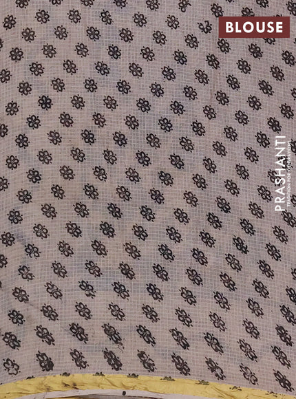 Kota kalamkari cotton saree beige and blue with allover prints and piping border