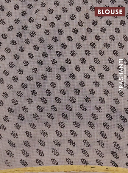 Kota kalamkari cotton saree beige and black with allover prints and piping border