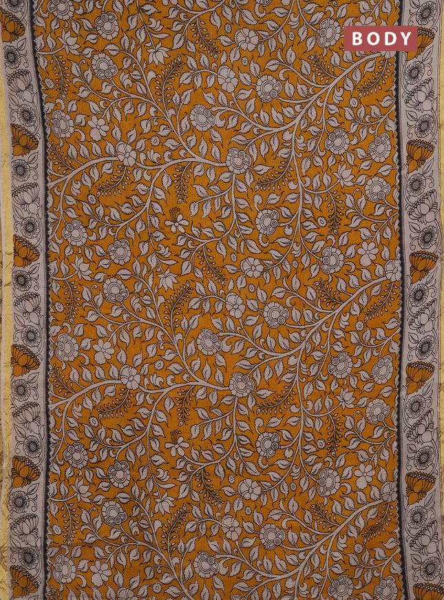 Kota kalamkari cotton saree mustard yellow and beige with allover prints and piping border