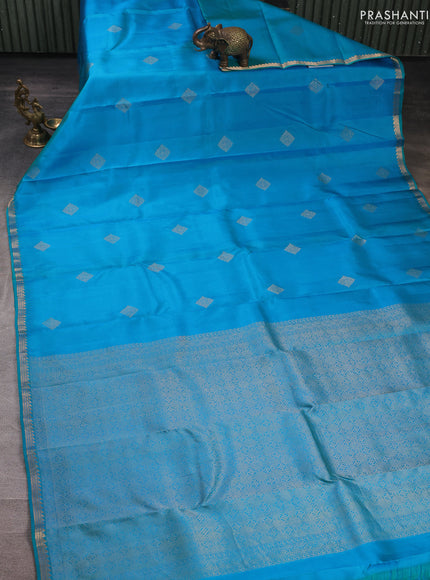 Pure kanchipuram silk saree teal blue with zari woven buttas and small zari woven border