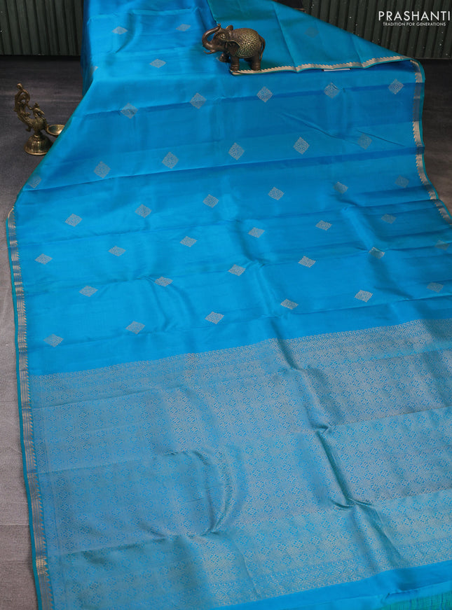 Pure kanchipuram silk saree teal blue with zari woven buttas and small zari woven border