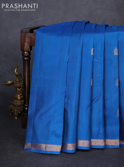 Pure kanchipuram silk saree teal blue with zari woven buttas and small zari woven border