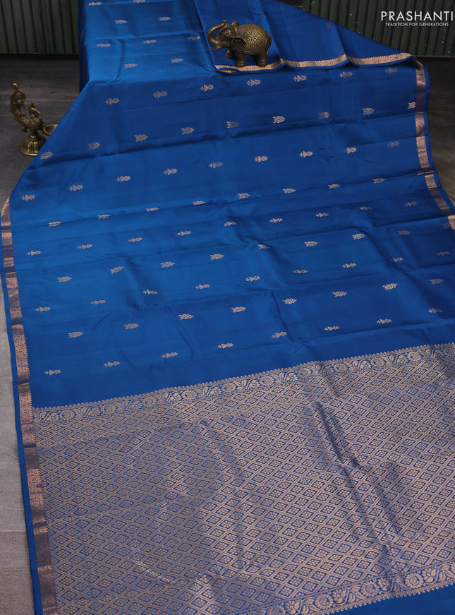 Pure kanchipuram silk saree teal blue with zari woven buttas and small zari woven border