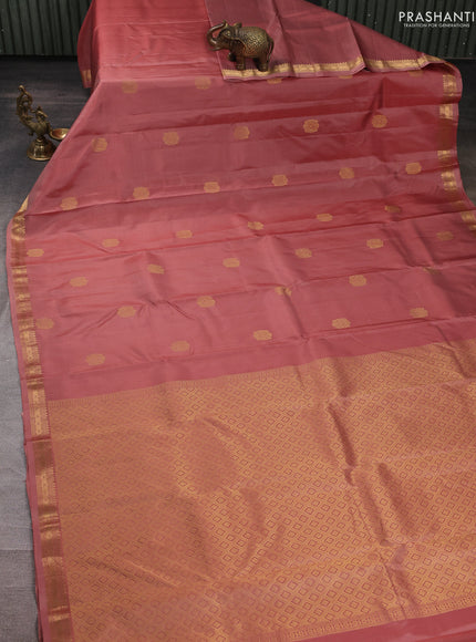 Pure kanchipuram silk saree dark peach with zari woven buttas and small zari woven border
