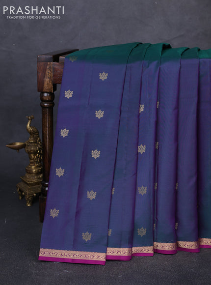 Pure kanchipuram silk saree dual shade of greenish purple and purple with allover zari woven buttas and small zari woven border