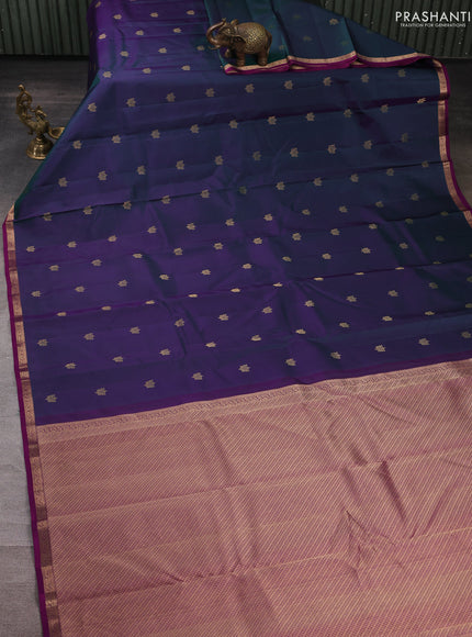 Pure kanchipuram silk saree dual shade of greenish purple and purple with allover zari woven buttas and small zari woven border