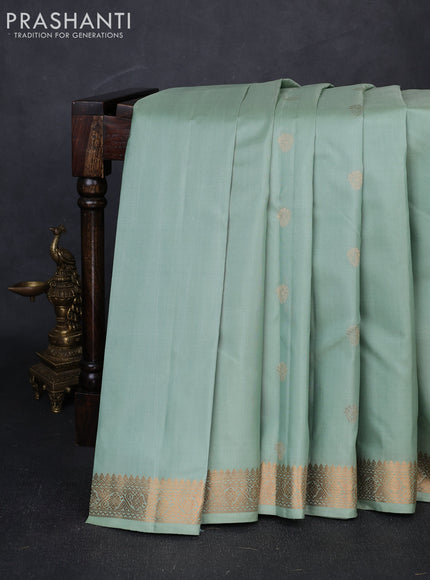 Pure kanchipuram silk saree pastel green with zari woven buttas and small zari woven border