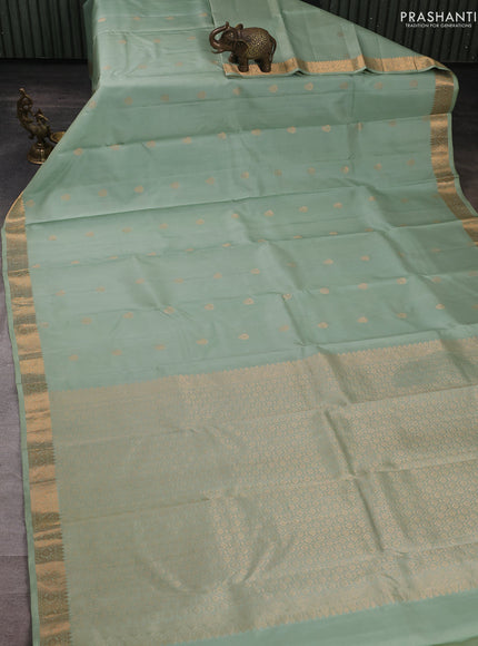 Pure kanchipuram silk saree pastel green with zari woven buttas and small zari woven border