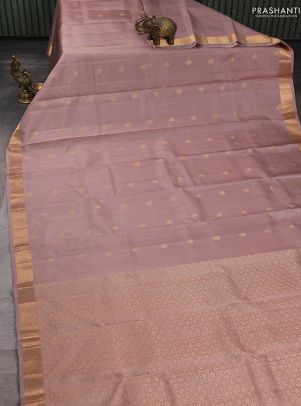 Pure kanchipuram silk saree pastel brown with zari woven buttas and small zari woven buttas