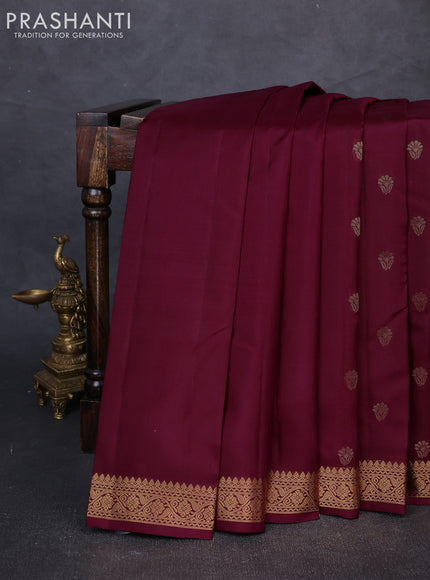 Pure kanchipuram silk saree wine shade with allover zari woven buttas and small zari woven border