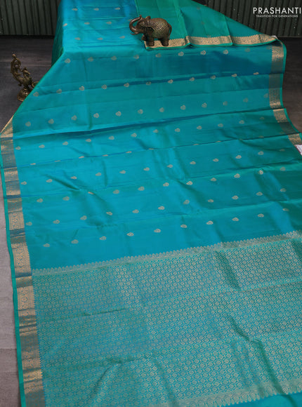 Pure kanchipuram silk saree teal green with allover zari woven buttas and small zari woven border