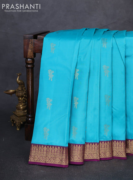 Pure kanchipuram silk saree teal blue and purple with zari woven buttas and small zari woven korvai border