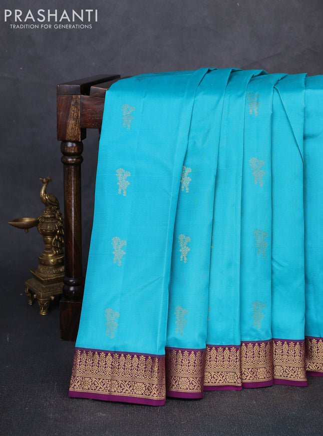 Pure kanchipuram silk saree teal blue and purple with zari woven buttas and small zari woven korvai border