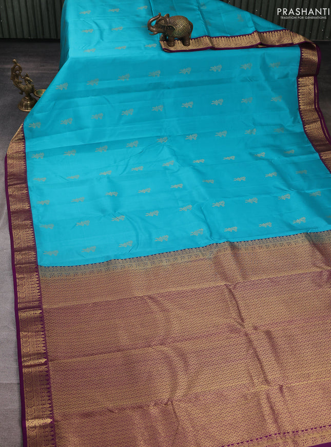 Pure kanchipuram silk saree teal blue and purple with zari woven buttas and small zari woven korvai border