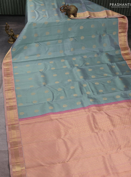 Pure kanchipuram silk saree bluish grey and dual shade of pink with allover zari woven buttas and zari woven korvai border