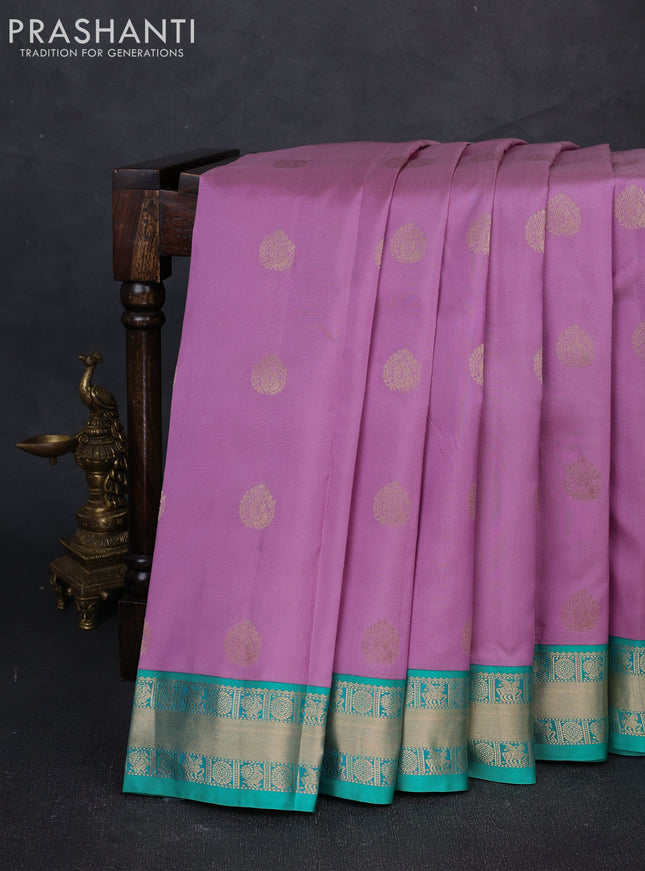 Pure kanchipuram silk saree lavender and teal green with allover zari woven buttas and zari woven korvai border