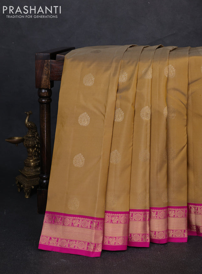 Pure kanchipuram silk saree sandal and pink with allover zari woven buttas and zari woven border