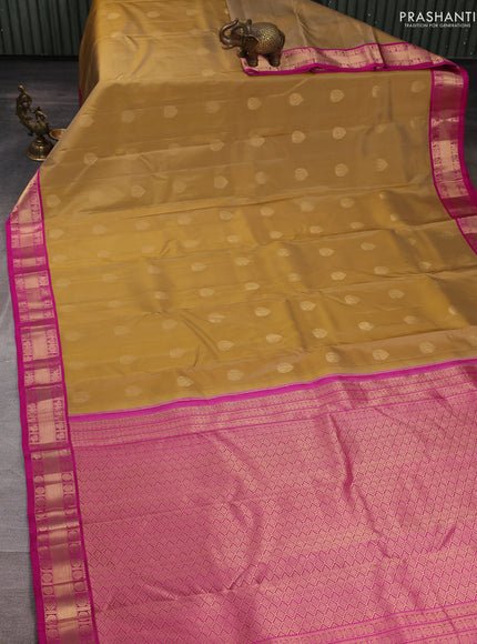 Pure kanchipuram silk saree sandal and pink with allover zari woven buttas and zari woven border