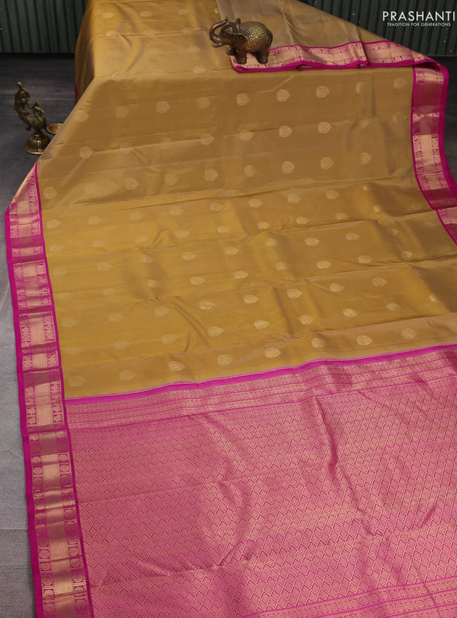 Pure kanchipuram silk saree sandal and pink with allover zari woven buttas and zari woven border