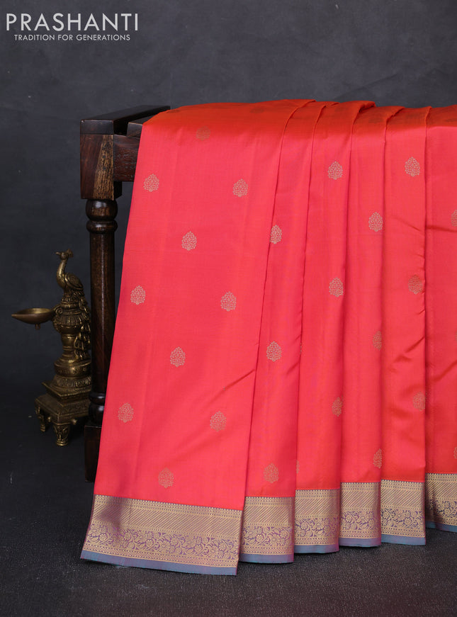 Pure kanchipuram silk saree orange and teal green with allover zari woven buttas and zari woven korvai border