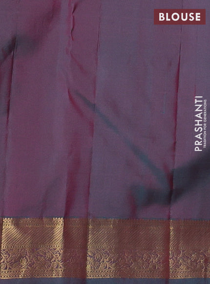 Pure kanchipuram silk saree orange and teal green with allover zari woven buttas and zari woven korvai border