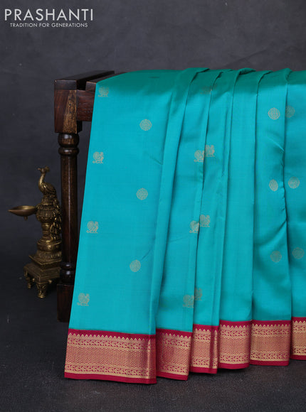 Pure kanchipuram silk saree teal green and wine shade with allover zari woven buttas and zari woven korvai border