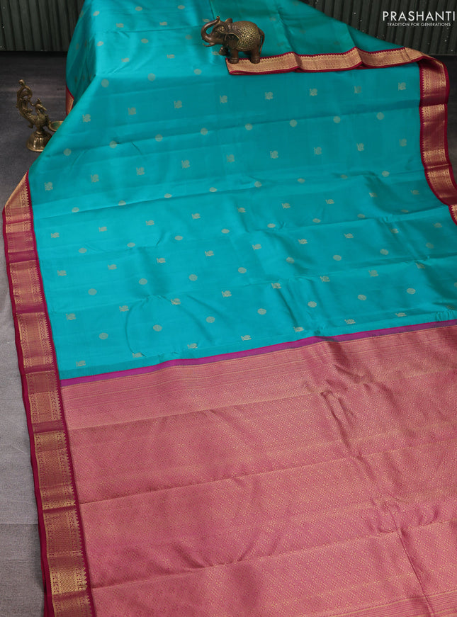 Pure kanchipuram silk saree teal green and wine shade with allover zari woven buttas and zari woven korvai border