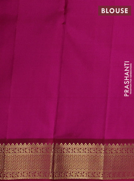 Pure kanchipuram silk saree dual shade of greenish blue and maroon with allover zari woven buttas and zari woven korvai border