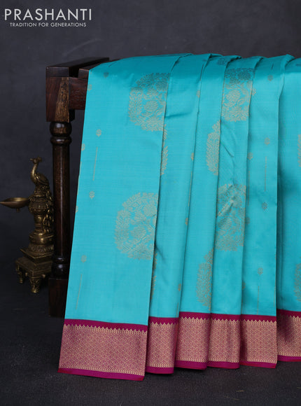 Pure kanchipuram silk saree teal blue and pink with allover zari woven buttas and zari woven korvai border