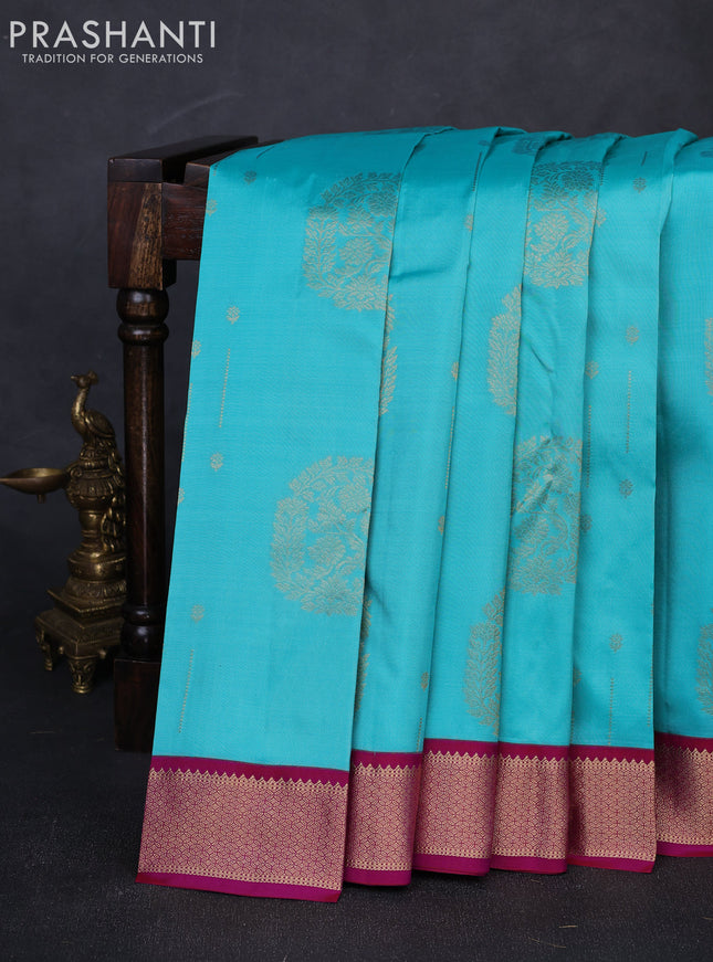 Pure kanchipuram silk saree teal blue and pink with allover zari woven buttas and zari woven korvai border